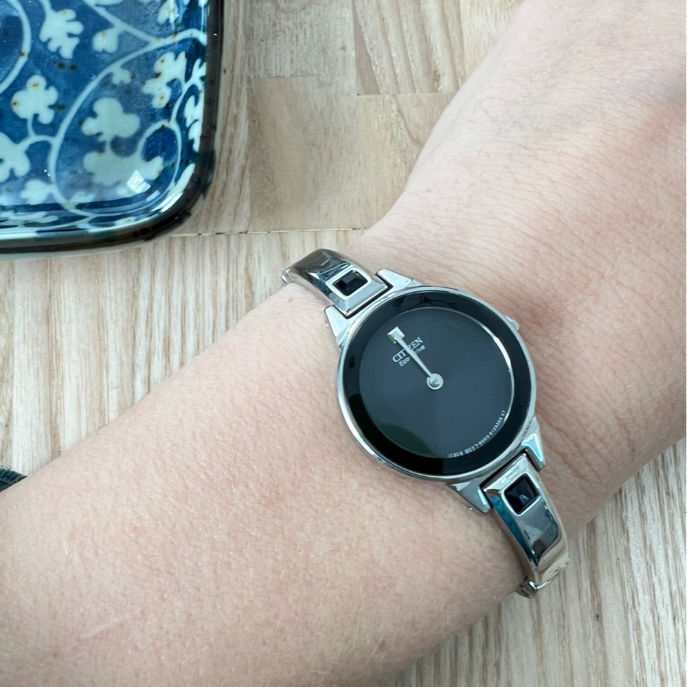 Citizen eco-drive ladies black dial silver tone bracelet solar watch